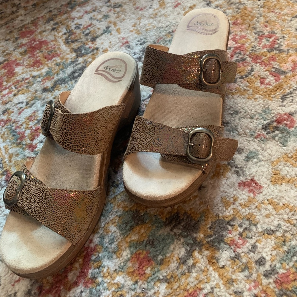 Dansko brown iridescent buckle clogs, size 40.